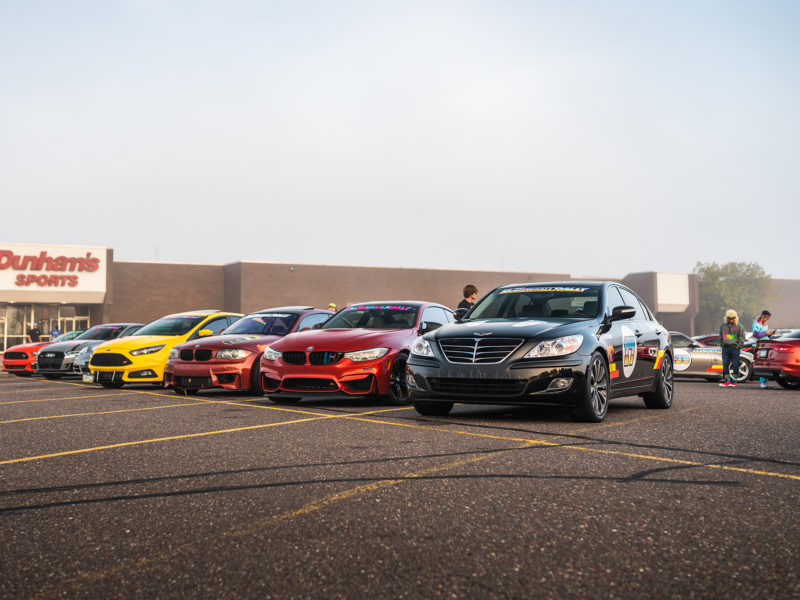 Vehicle Vinyl Wraps, rally wraps row of cars from side