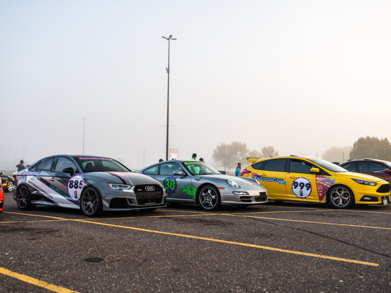 Vehicle Vinyl Wraps, rally wraps row of cars from side