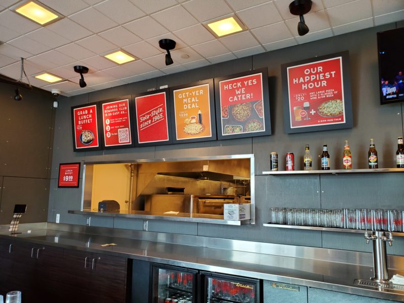 Custom Menu Insert Signs - Red's Savoy Pizza indoor sign