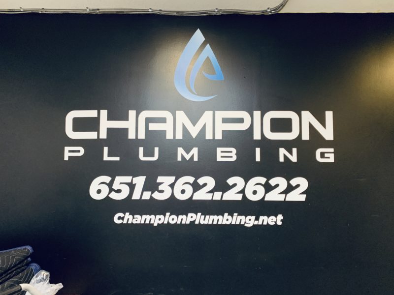 Vinyl Logo Decal - Champion Plumbing indoor sign