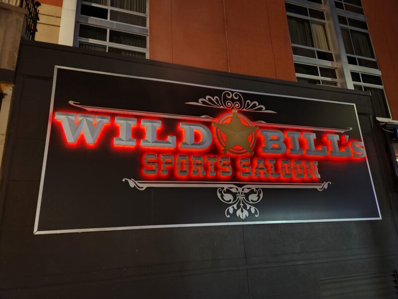 Wild Bills Sports Saloon - Cast Metal Prismatic - Reverse Halo Illuminated Letters